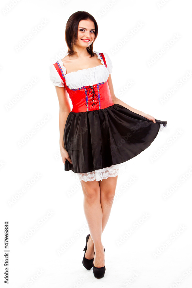 young and beautiful woman in a traditional Bavarian dress young and beautiful woman in a traditional Bavarian dress