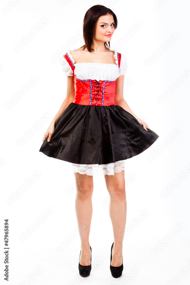 young and beautiful woman in a traditional Bavarian dress young and beautiful woman in a traditional Bavarian dress