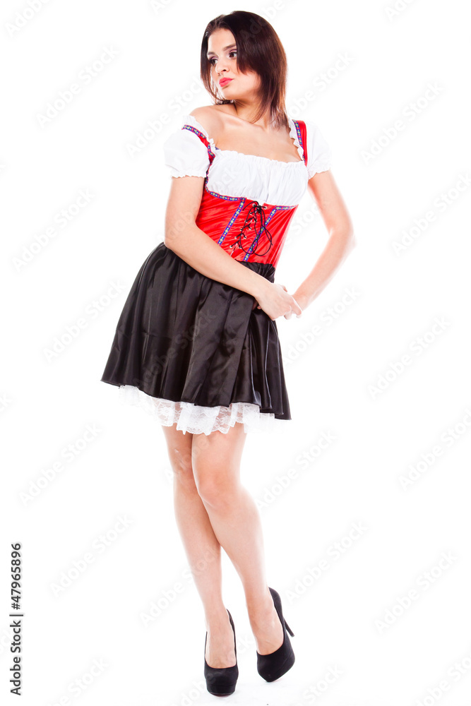 young and beautiful woman in a traditional Bavarian dress young and beautiful woman in a traditional Bavarian dress