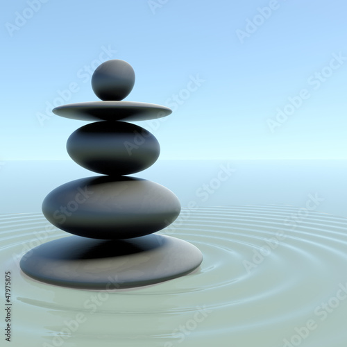 Zen stones on calm water