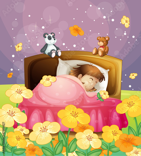 A girl sleeping in her bed