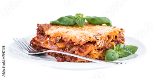 Piece of Lasagne isolated on white