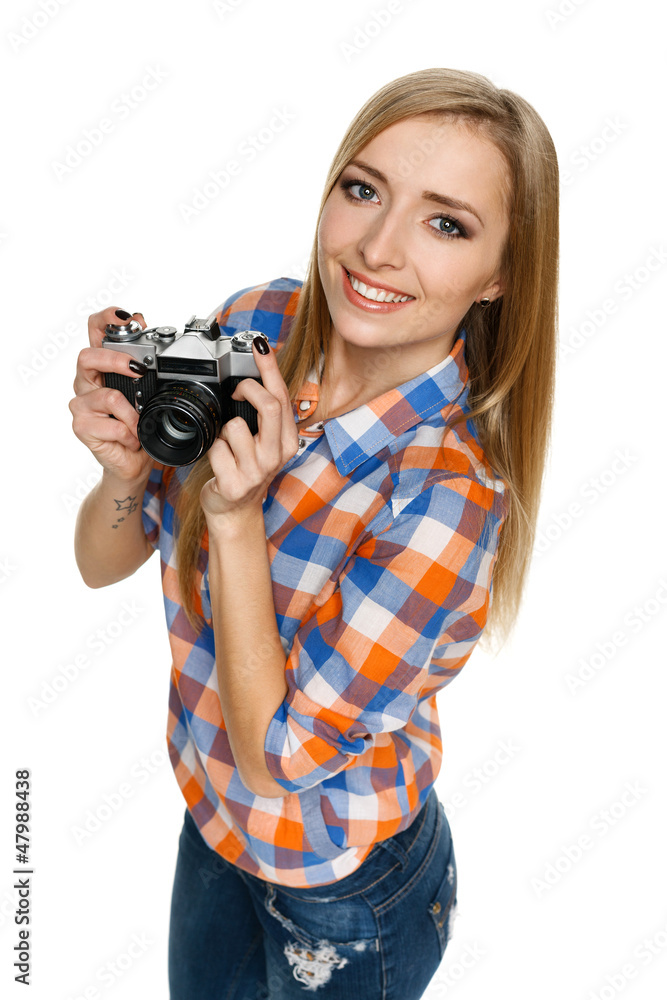 High angle view of smiling casual female with camera High angle view of smiling casual female with camera