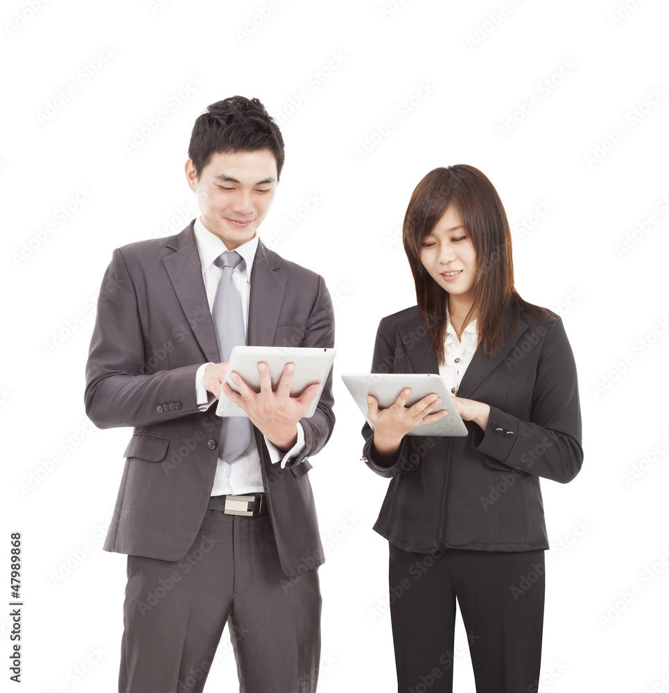 businessman and businesswoman using tablet pc businessman and businesswoman using tablet pc
