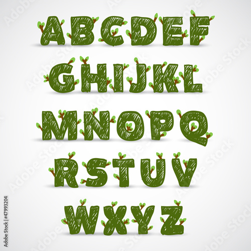 Handwritten ABC alphabet with leaf
