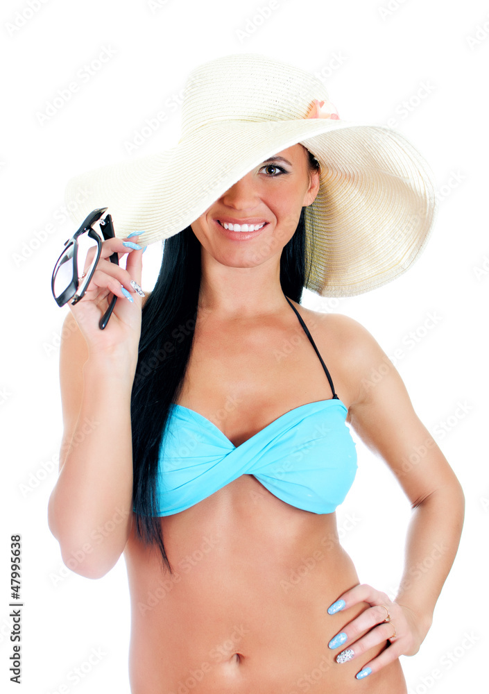 Pretty young woman in bikini and straw hat. Isolated on white Pretty young woman in bikini and straw hat. Isolated on white