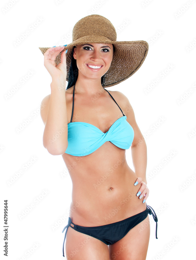 Pretty young woman in bikini and straw hat. Isolated on white Pretty young woman in bikini and straw hat. Isolated on white