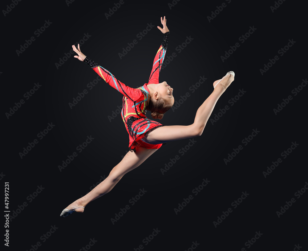 Fototapeta premium Young woman in gymnast suit posing