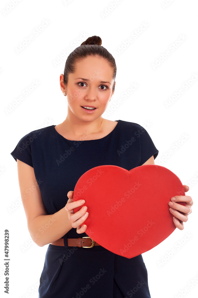 Woman holding Valentines Day heart sign Woman holding Valentines Day heart sign