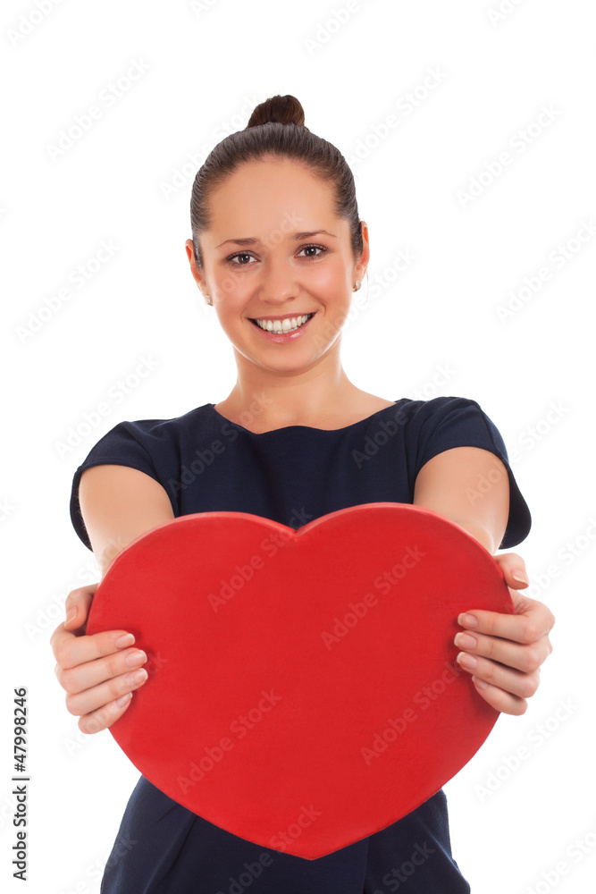 Woman holding Valentines Day heart sign Woman holding Valentines Day heart sign