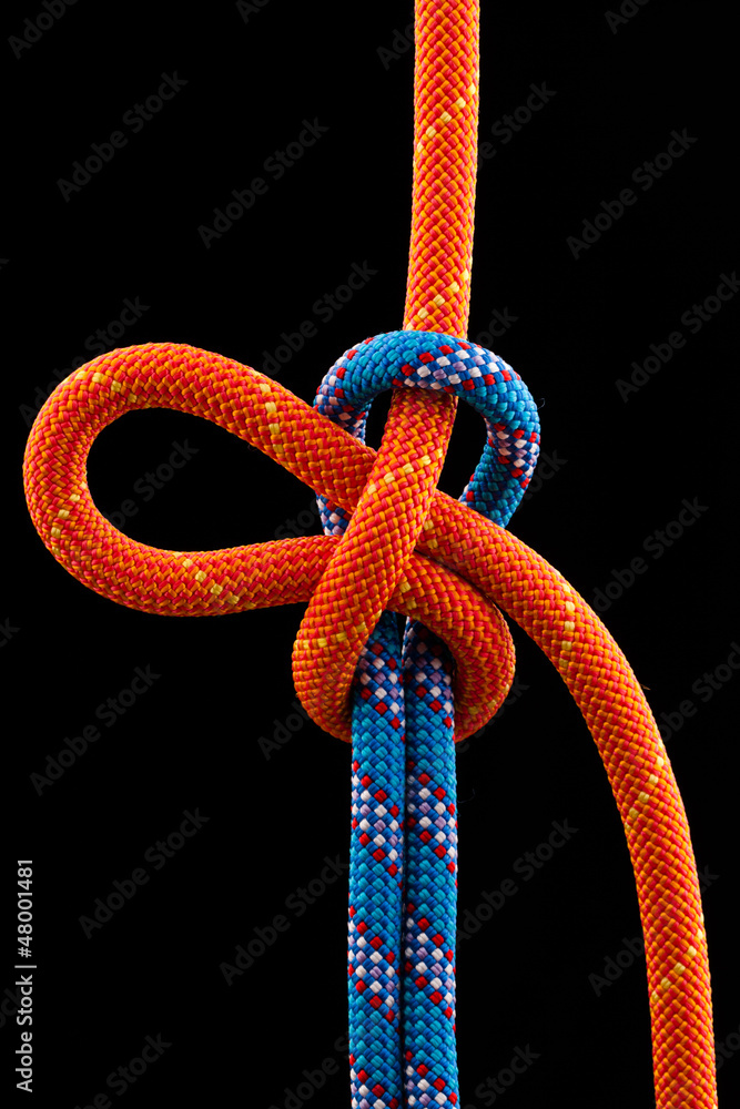 Naklejka premium rope knot isolated on black background