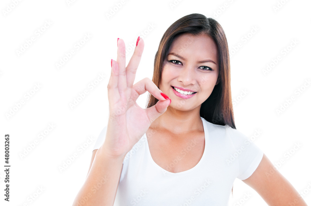 Attractive Young Woman Showing OK Gesture Attractive Young Woman Showing OK Gesture