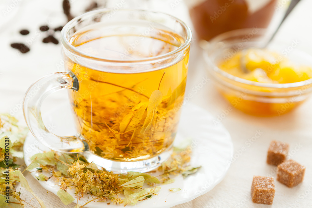 Transparent cup golden linden tea Transparent cup golden linden tea