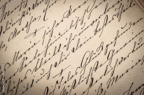 vintage ink handwriting. paper background photo