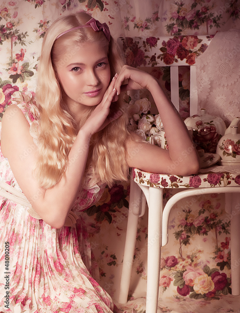Young girl in pink dress on background. Young girl in pink dress on background.
