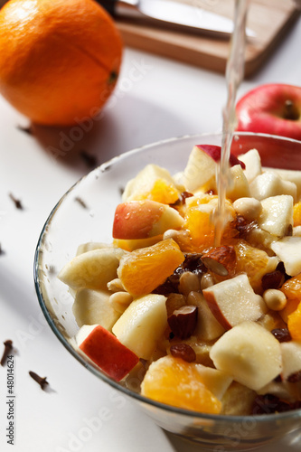 Fruit salad with spice and water