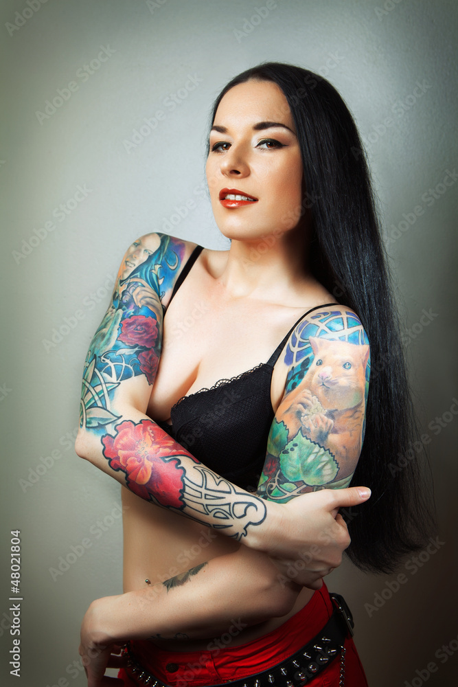 pretty young girl with tattoo. lovely woman.