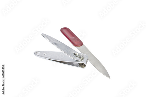 nail clipper and nail file on white background