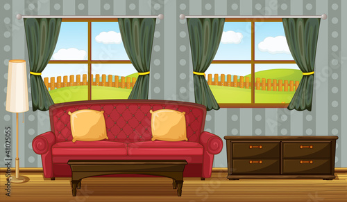 A red sofa and side table