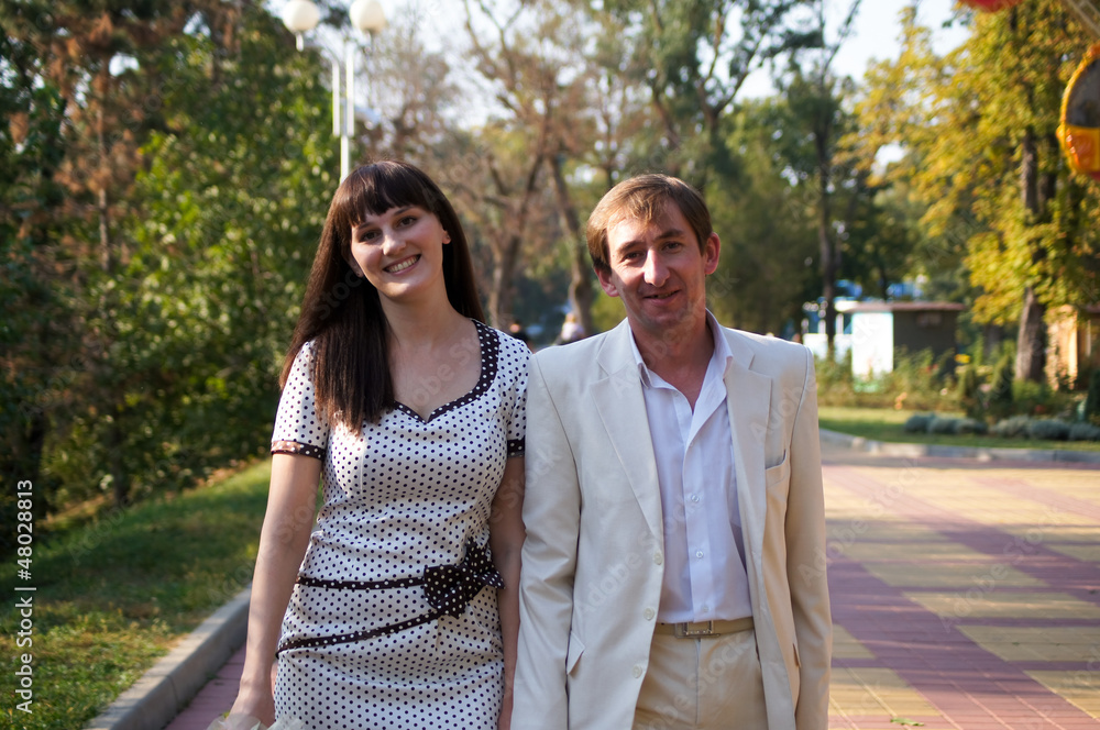 Fototapeta premium Happy young pair on walk