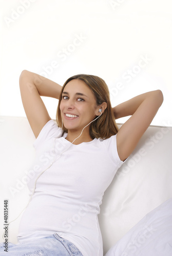 young woman relaxing and listening music