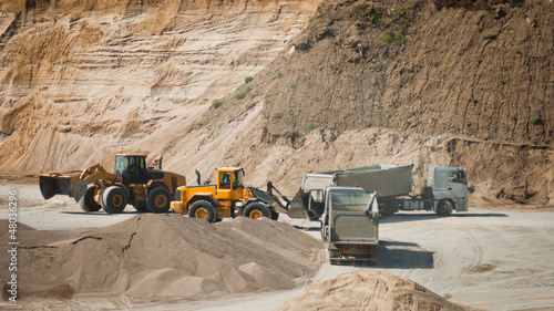 Machines working at gravel pit