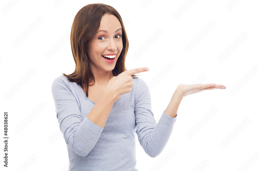 Excited woman pointing at something Excited woman pointing at something
