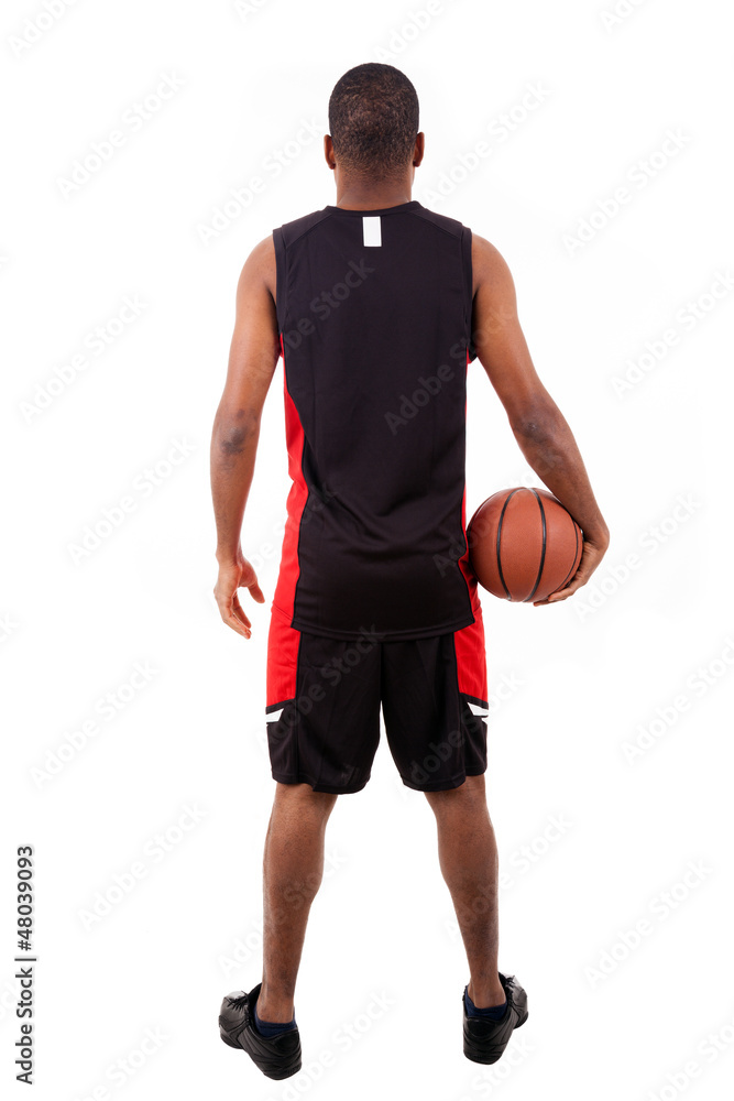 Fototapeta premium Basketball player from back, isolated in white background