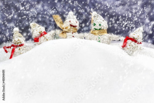 family is happy snowmen
