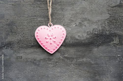 Valentine's Day love heart on rustic style background