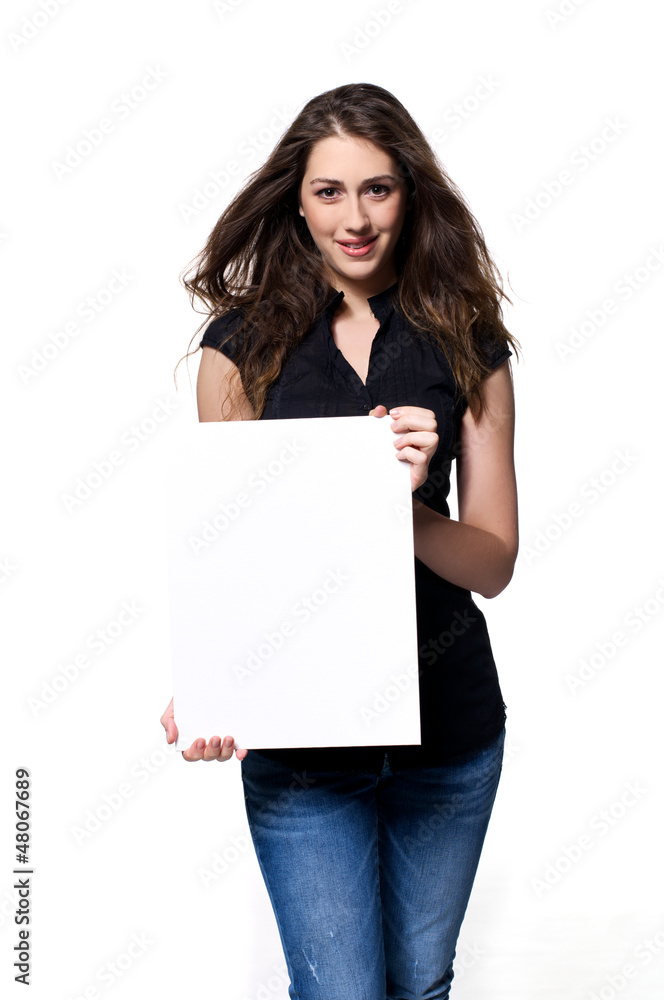 Young woman holding a billboard in her hand Young woman holding a billboard in her hand