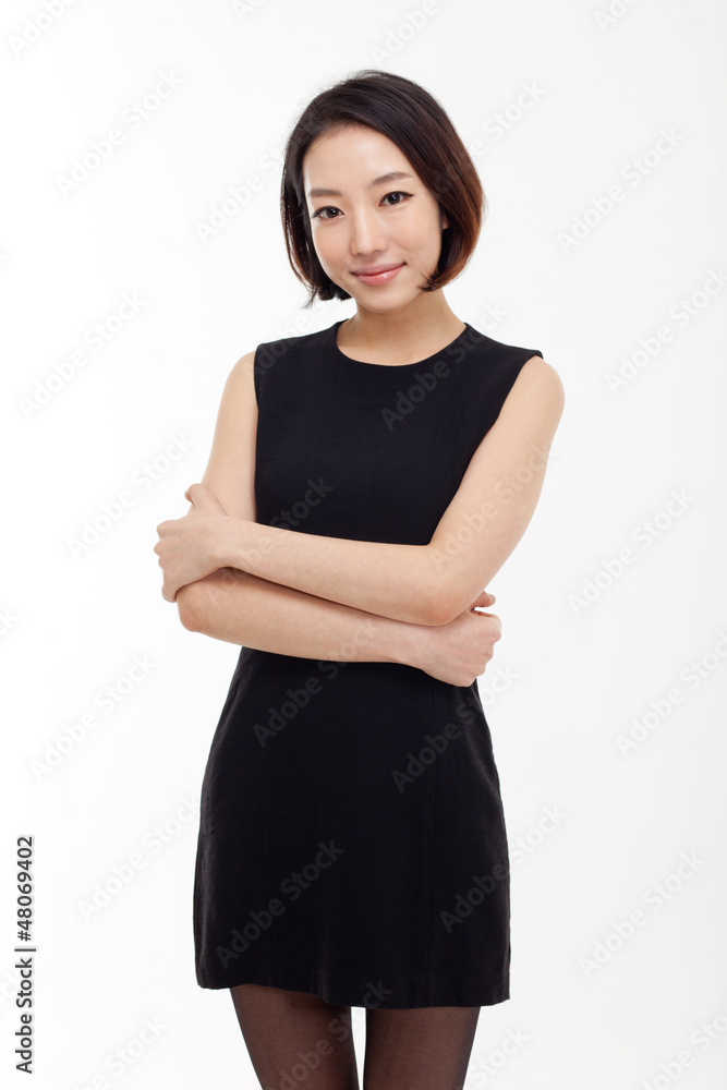 Yong pretty Asian business woman isolated on white background. Yong pretty Asian business woman isolated on white background.