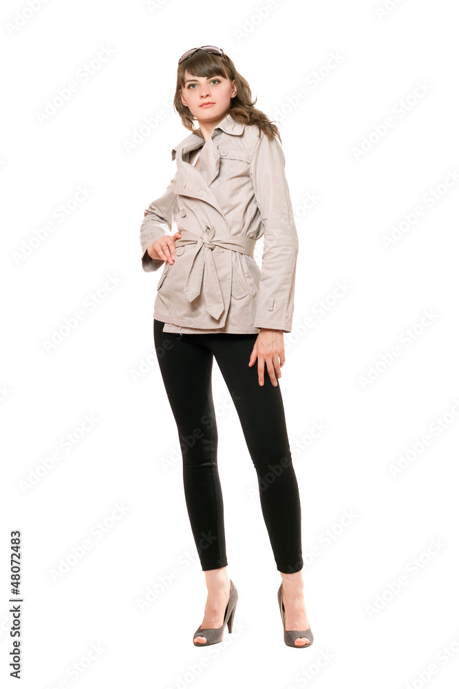 Nice girl wearing a coat and black leggings. Isolated Nice girl wearing a coat and black leggings. Isolated