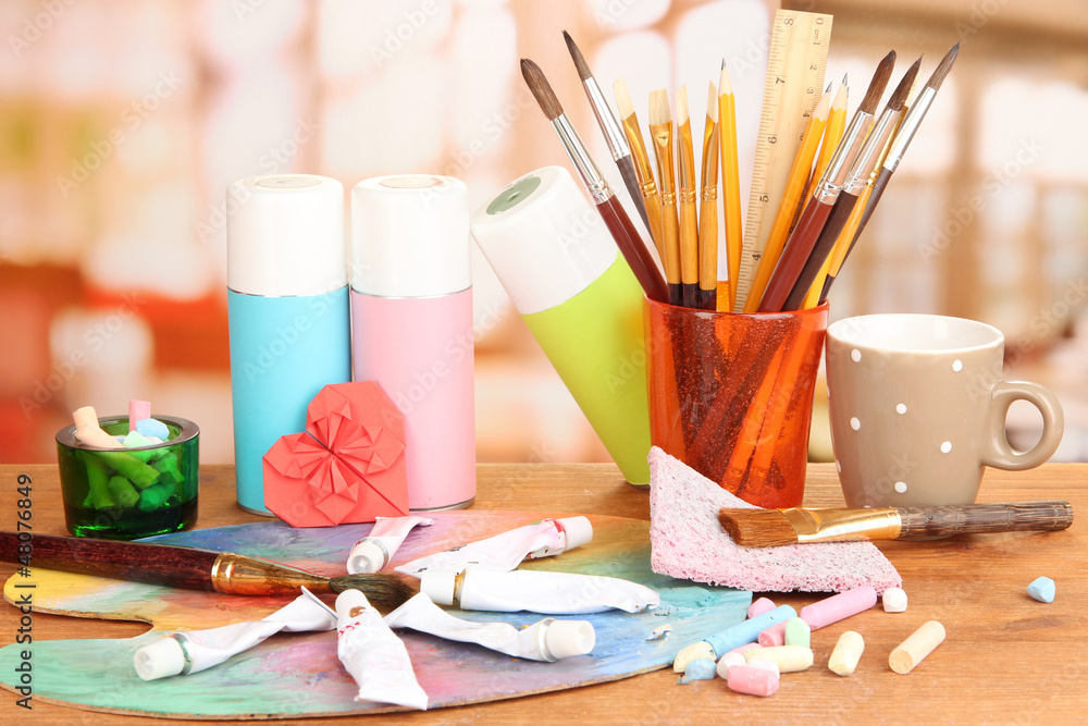 Artistic equipment: paint, brushes and art palette Artistic equipment: paint, brushes and art palette