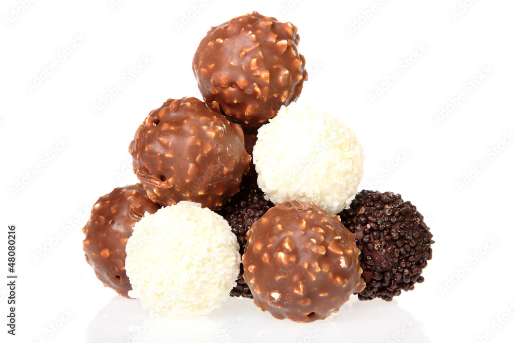 Stack of chocolate nut balls on white background Stack of chocolate nut balls on white background