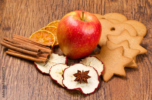 fresh apple with biscuit,cinnamon and fruit dried