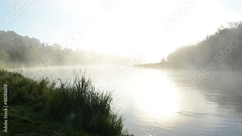 dense fog rise flow river water early morning sunrise sunlight