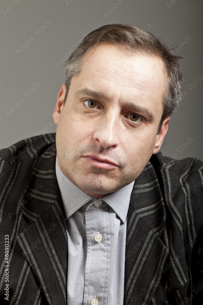 portrait of adult man isolated on dark background portrait of adult man isolated on dark background