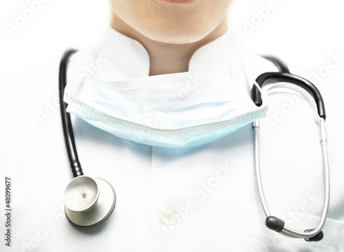 Doctor in a white coat with a stethoscope photo