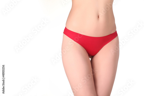 A part of woman body in red panties