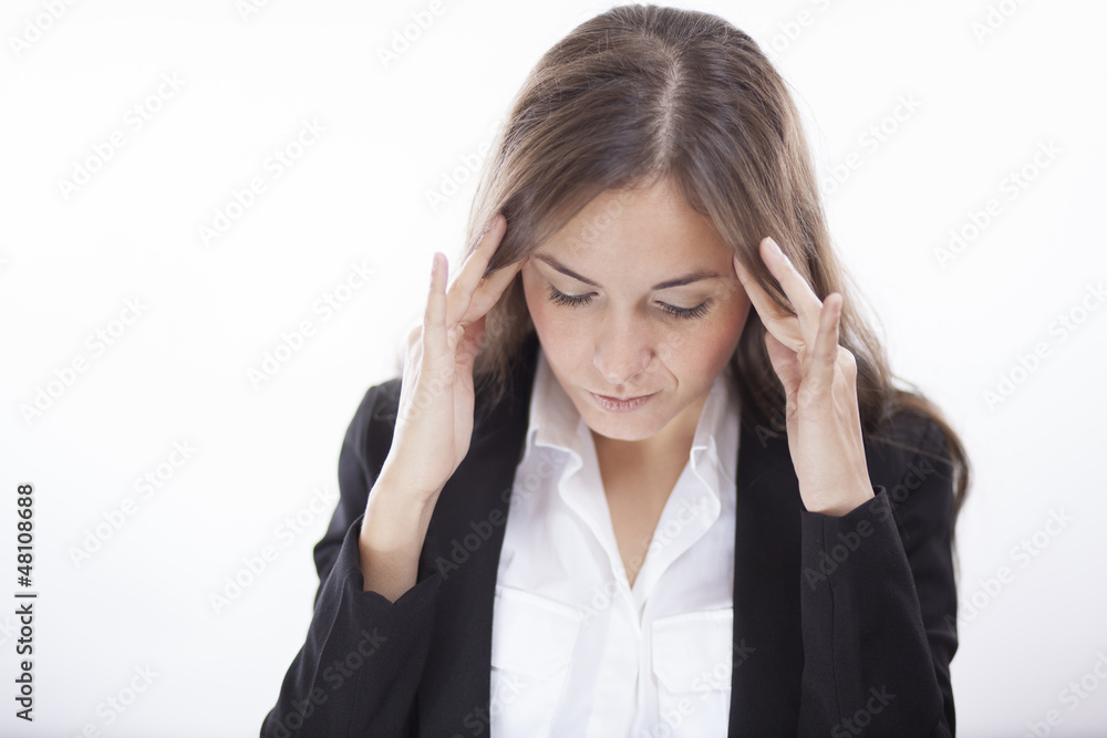 Young business woman trying to concentrate Young business woman trying to concentrate