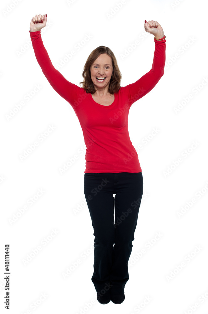 Obraz premium Jubilant lady celebrating her success