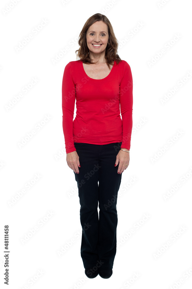 Obraz premium Profile shot of a middle aged cheerful woman