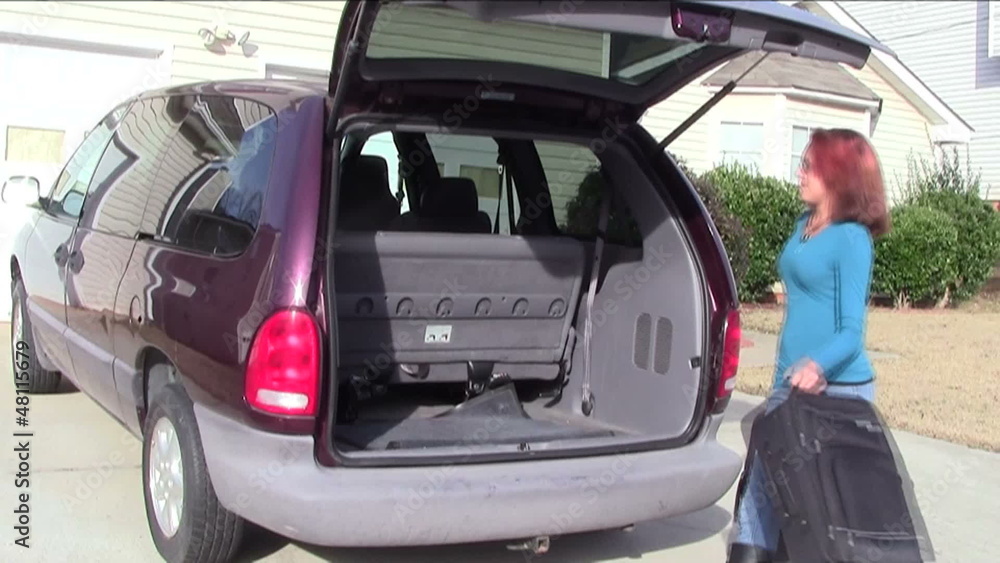 Packing Luggage into Van Packing Luggage into Van