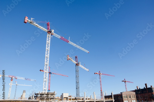 Cranes on top of new condo construction