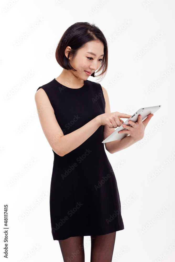 Using pad PC business woman isolated on white background. Using pad PC business woman isolated on white background.