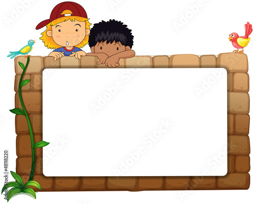 Kids with white board on wall