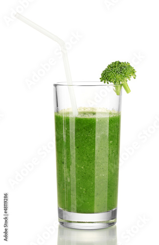 Green vegetable juice in glass isolated on white