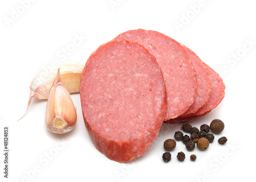 Sausage and spices isolated on white background