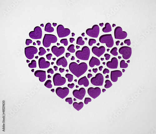 Valentine day heart made of small hearts on paper card